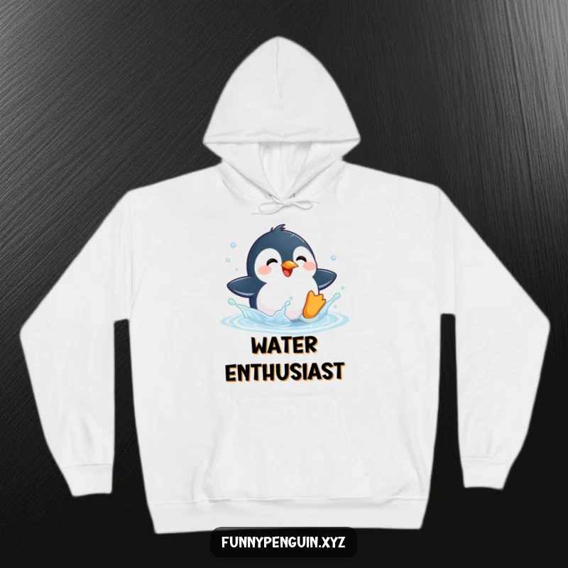 Funny hoodie depicting a kawaii penguin playfully splashing in a puddle, radiating pure delight and happiness.